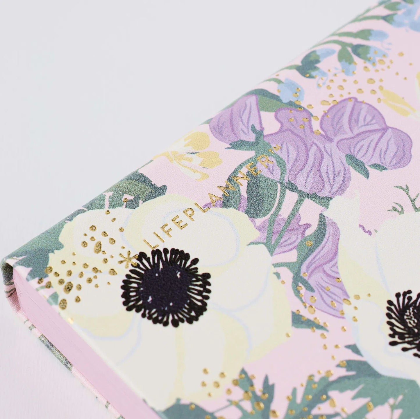 Floral notebook with 'Lifepal' branding on a light gray background