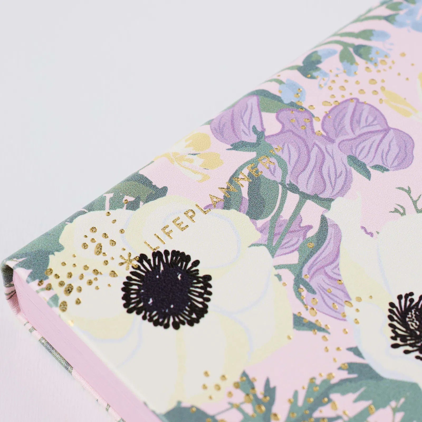 Floral notebook with 'Lifepal' branding on a light gray background
