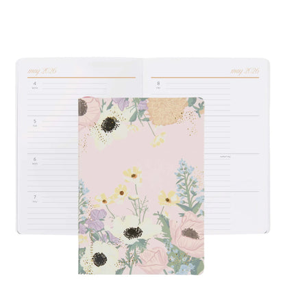 Floral planner with a plain page on a white background