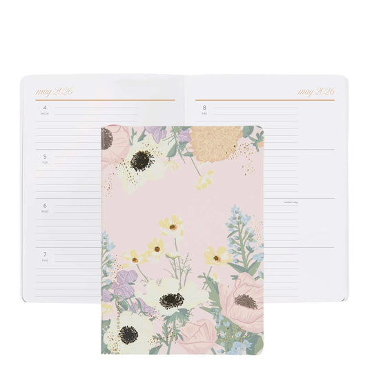 Floral planner with a plain page on a white background
